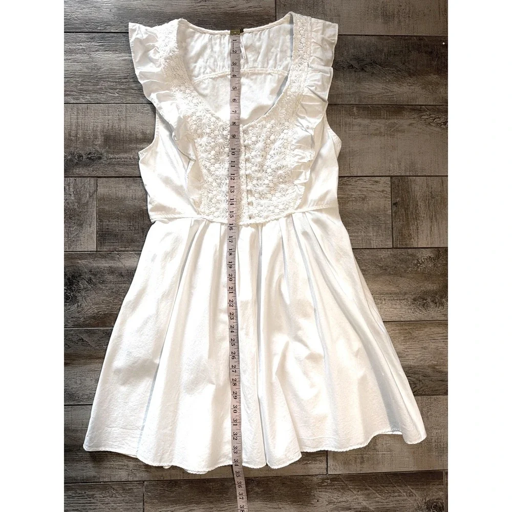 FREE PEOPLE Womens sz Large Half Moon white crochet ruffled fit & flare  pockets